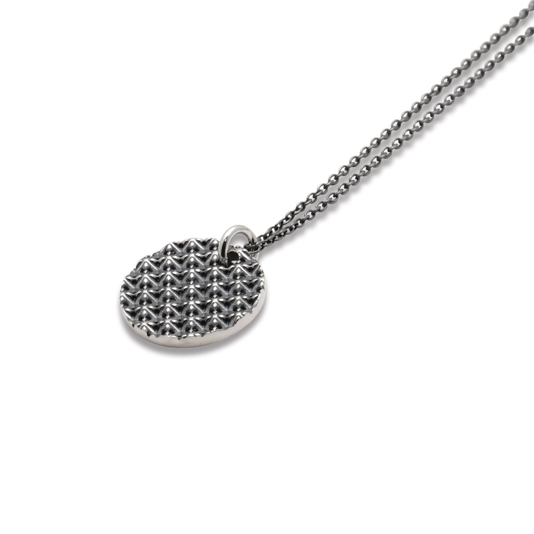 TRIPLE X STUDS COIN PENDANT