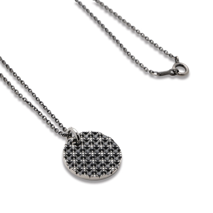 TRIPLE X STUDS COIN PENDANT