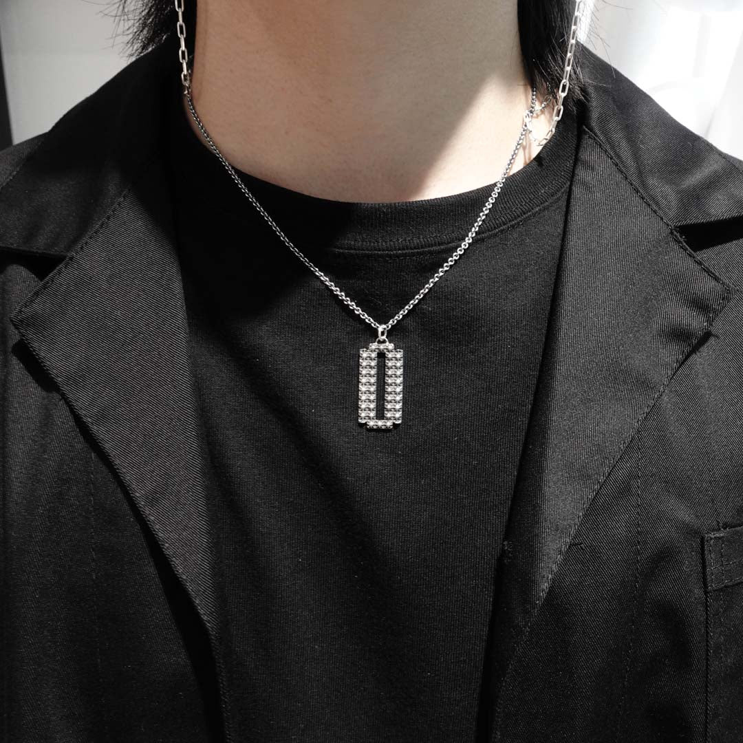 TRIPLE X STUDS RAZOR PENDANT